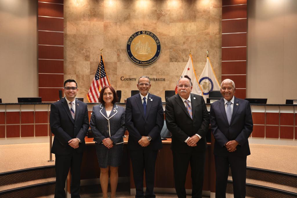 All five supervisors standing
