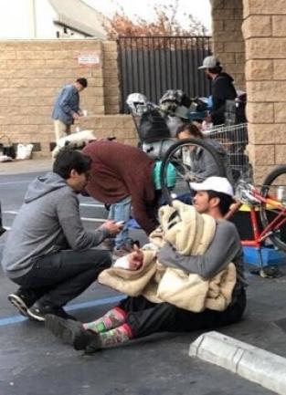 volunteers helping the homeless